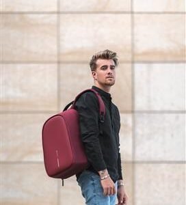 anti theft backpack man holding backpack